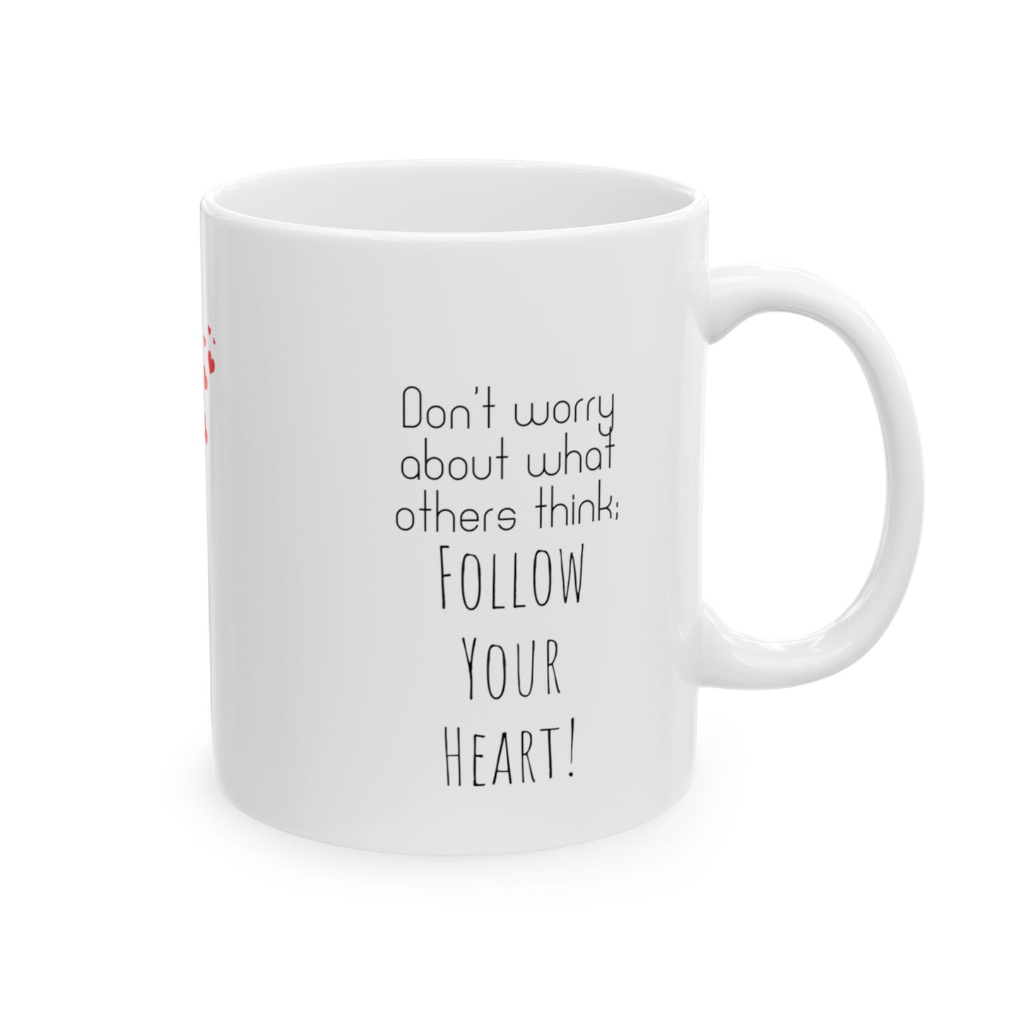 White ceramic mug with red hearts in the middle and the text on the both sides of the mug: Don't Worry About What Others Think, Follow Your Heart.