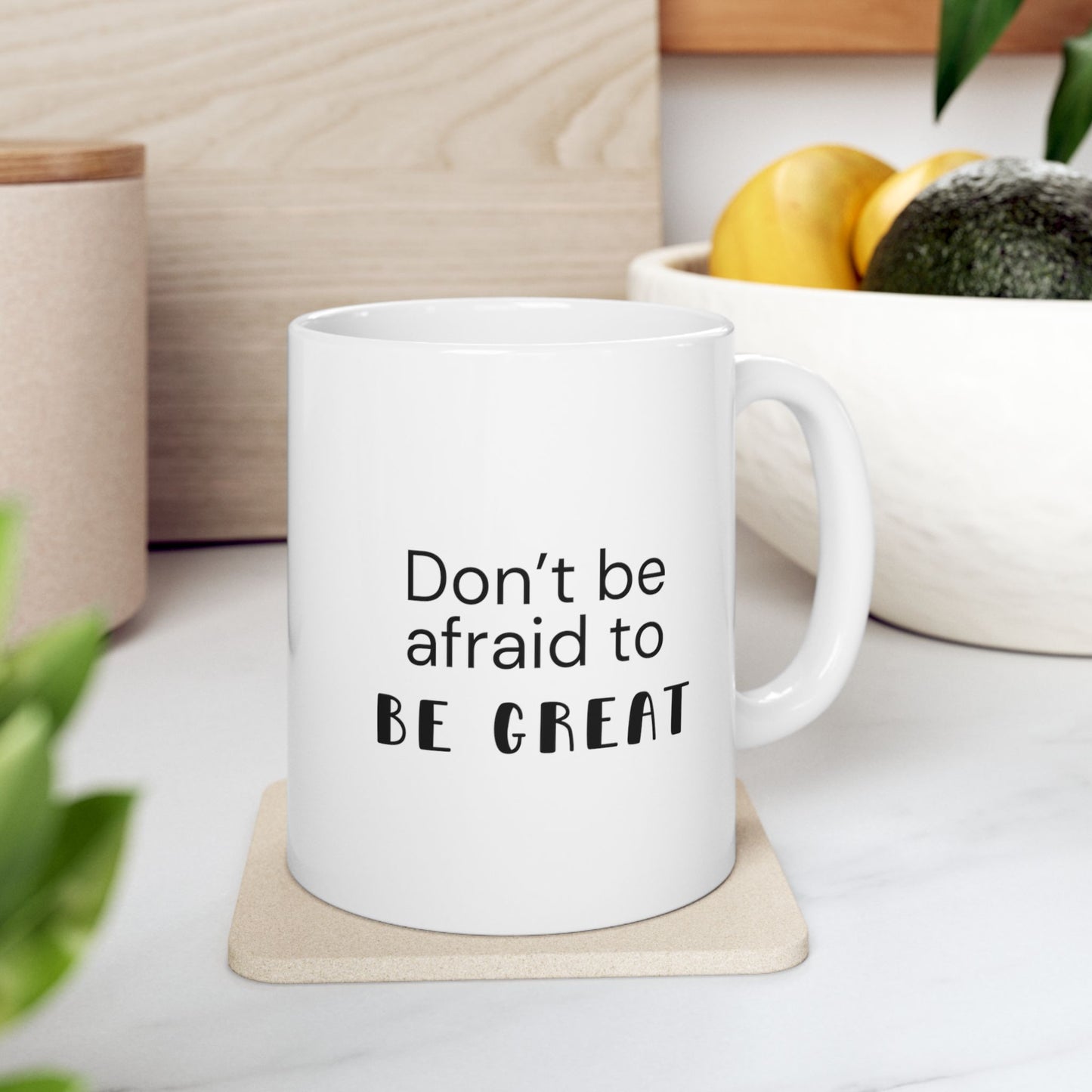 Motivational mug with the text: Don't be afraid to be great. White ceramic mug of size 11 oz.