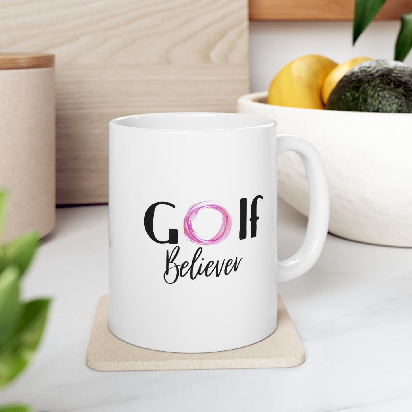 Golf Believer text on the mug.