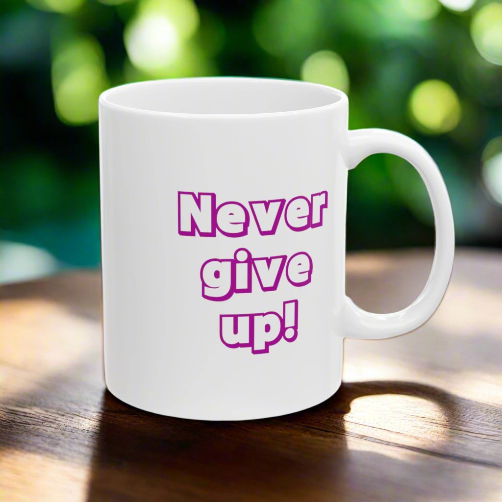 Inspirational ceramic mug, designed to uplift your spirits every time you take a sip! This mug features the motivating message 'Never give up'.