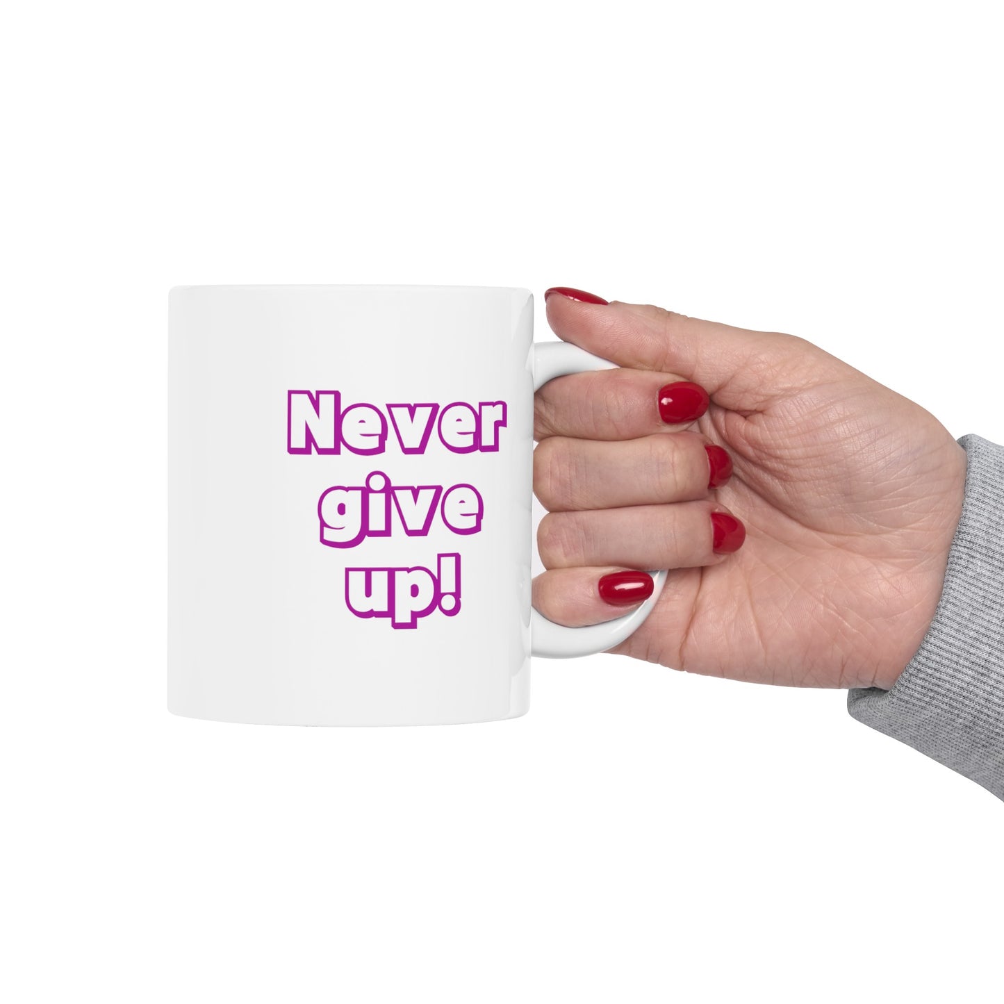 Inspirational ceramic mug, designed to uplift your spirits every time you take a sip! This mug features the motivating message 'Never give up'.