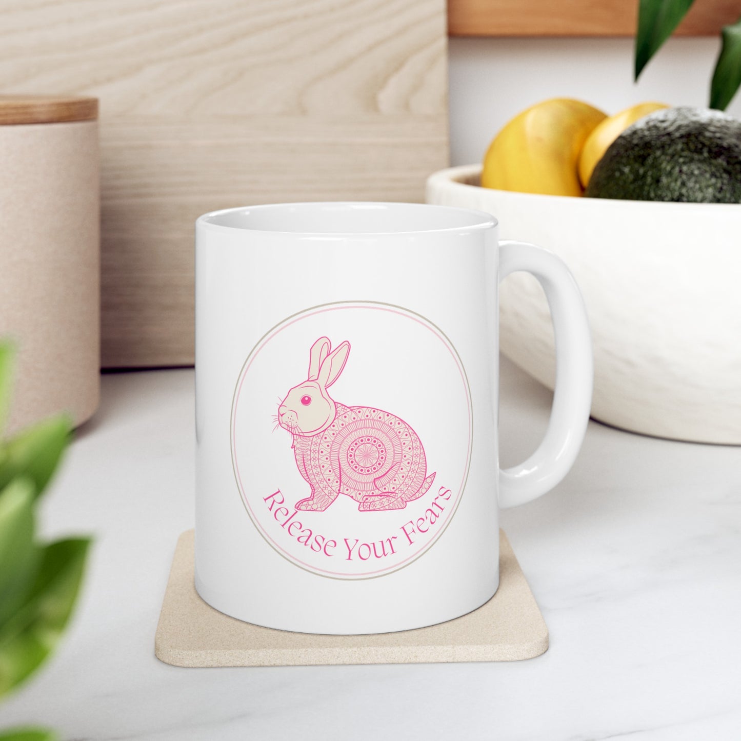 Embrace tranquility with this enchanting 11-ounce ceramic mug. The intricate mandala pattern wraps around the mug, and a serene rabbit image graces both sides. Crafted from premium quality white ceramic, it’s microwave and dishwasher-safe. Whether you’re sipping coffee, tea, or hot cocoa, let this mug remind you to release your fears and find peace in each sip.