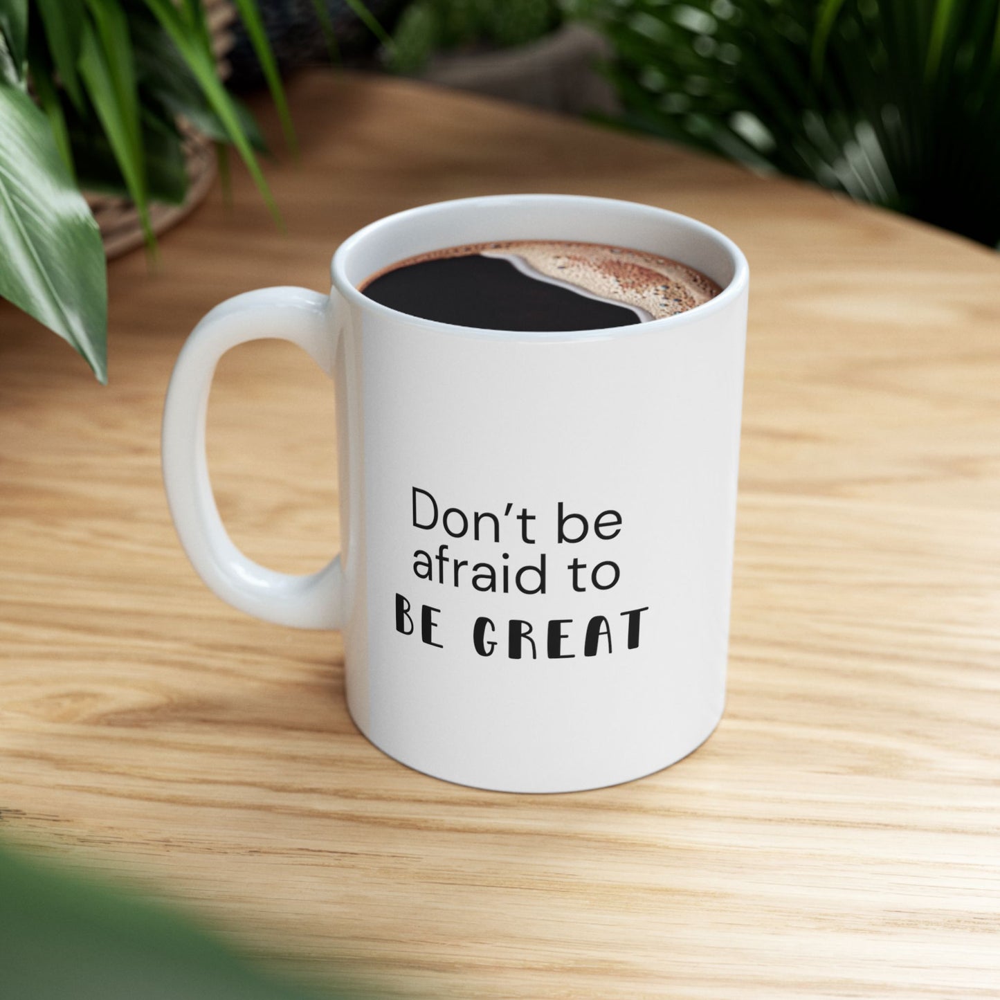 Motivational mug with the text: Don't be afraid to be great. White ceramic mug of size 11 oz.