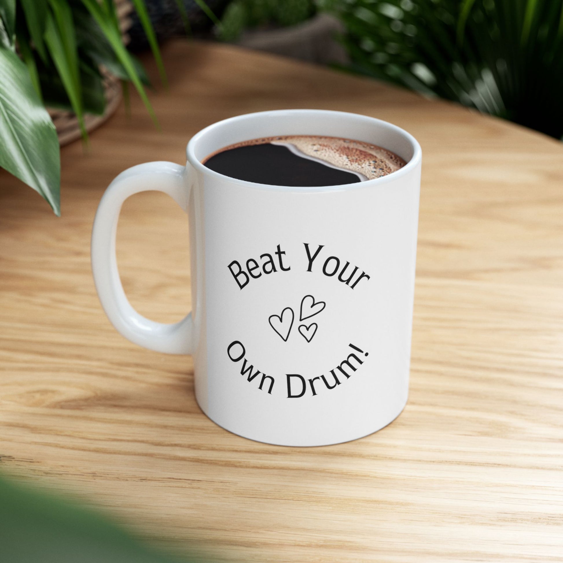 Beat Your Own Drum is white Ceramic Mug of size 11 oz and a perfect mug for motivation or daily reminder.