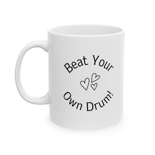 Beat Your Own Drum is white Ceramic Mug of size 11 oz and a perfect mug for motivation or daily reminder.