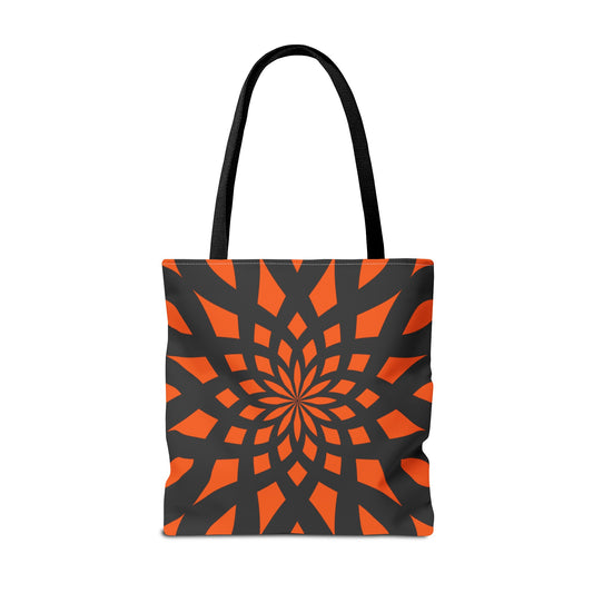 Orange tote bag with the print of mandala like pattern in black. Made with 100% polyester. It is highly durable and perfect for everyday use. A bag is non-woven laminate inside, cotton handles, and are available in 3 sizes, 1x large storage compartment.