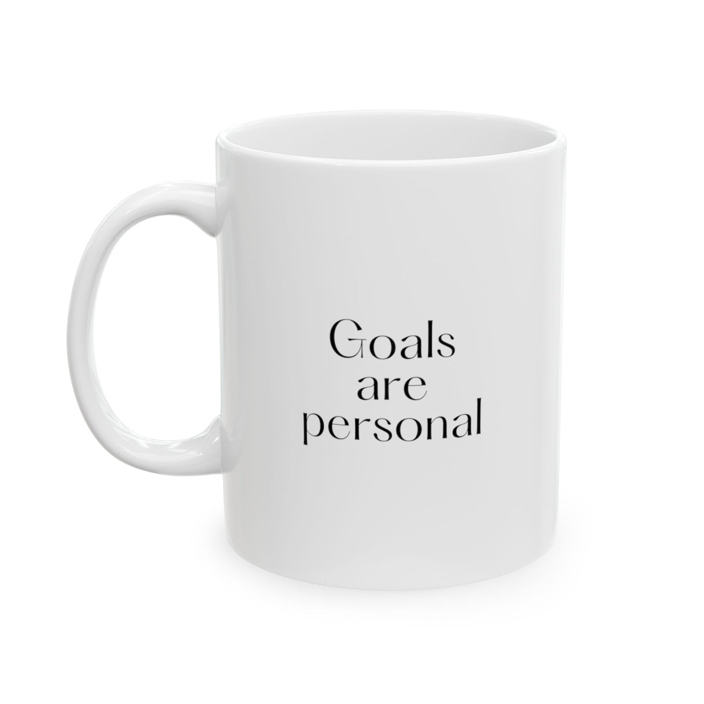 White ceramic mug with the text Goals are personal.