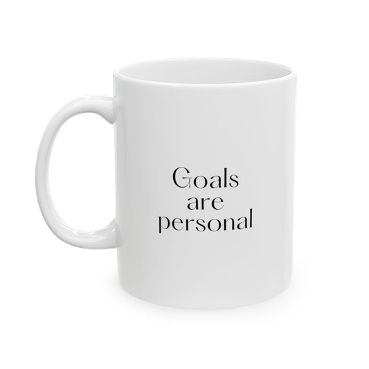 White ceramic mug with the text Goals are personal.