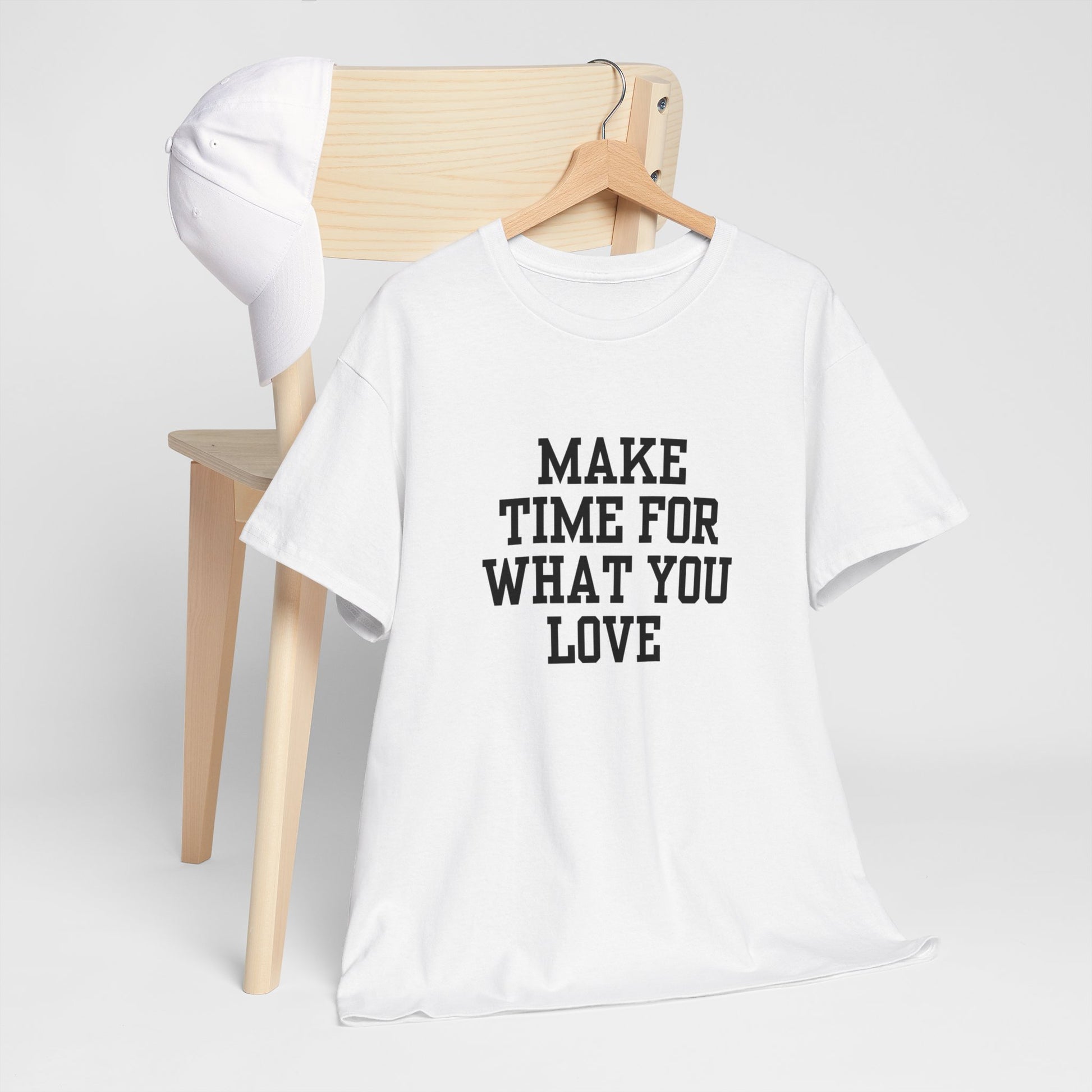 White t-shirt. Motivation phrase Make time for what you love.