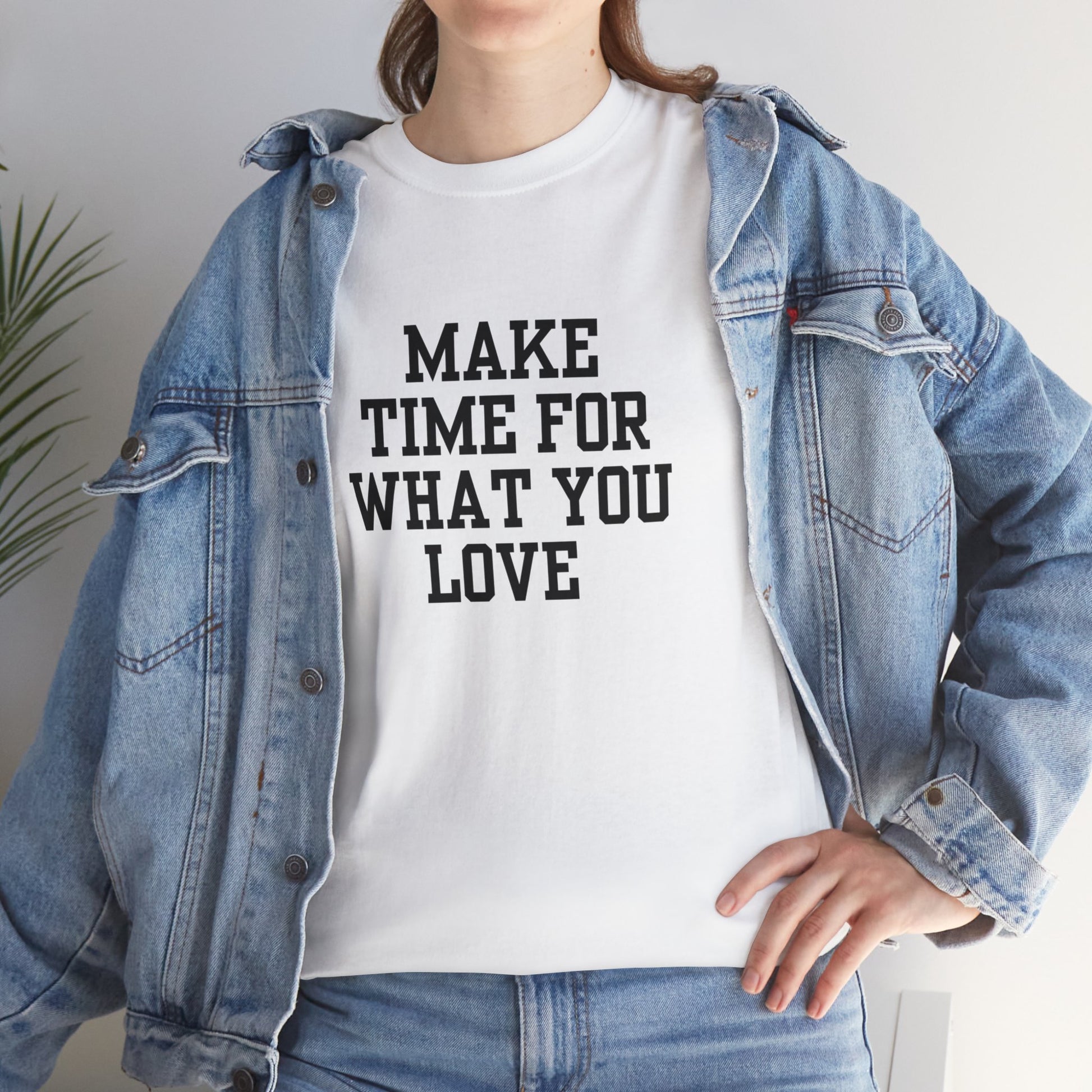 White t-shirt. Motivation phrase Make time for what you love.