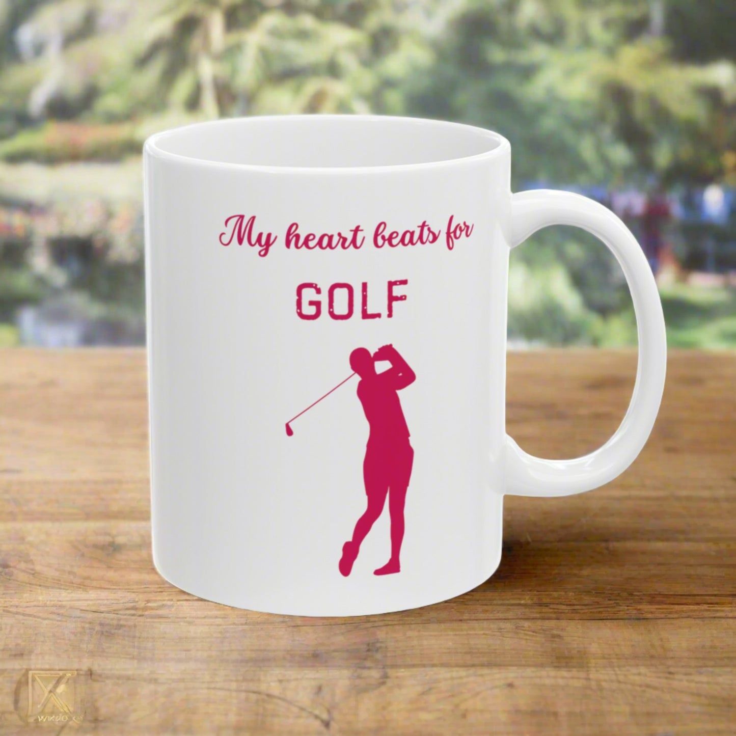 Ceramic mug, 11 oz, image of a golfer and text 'My heart beats for golf'.