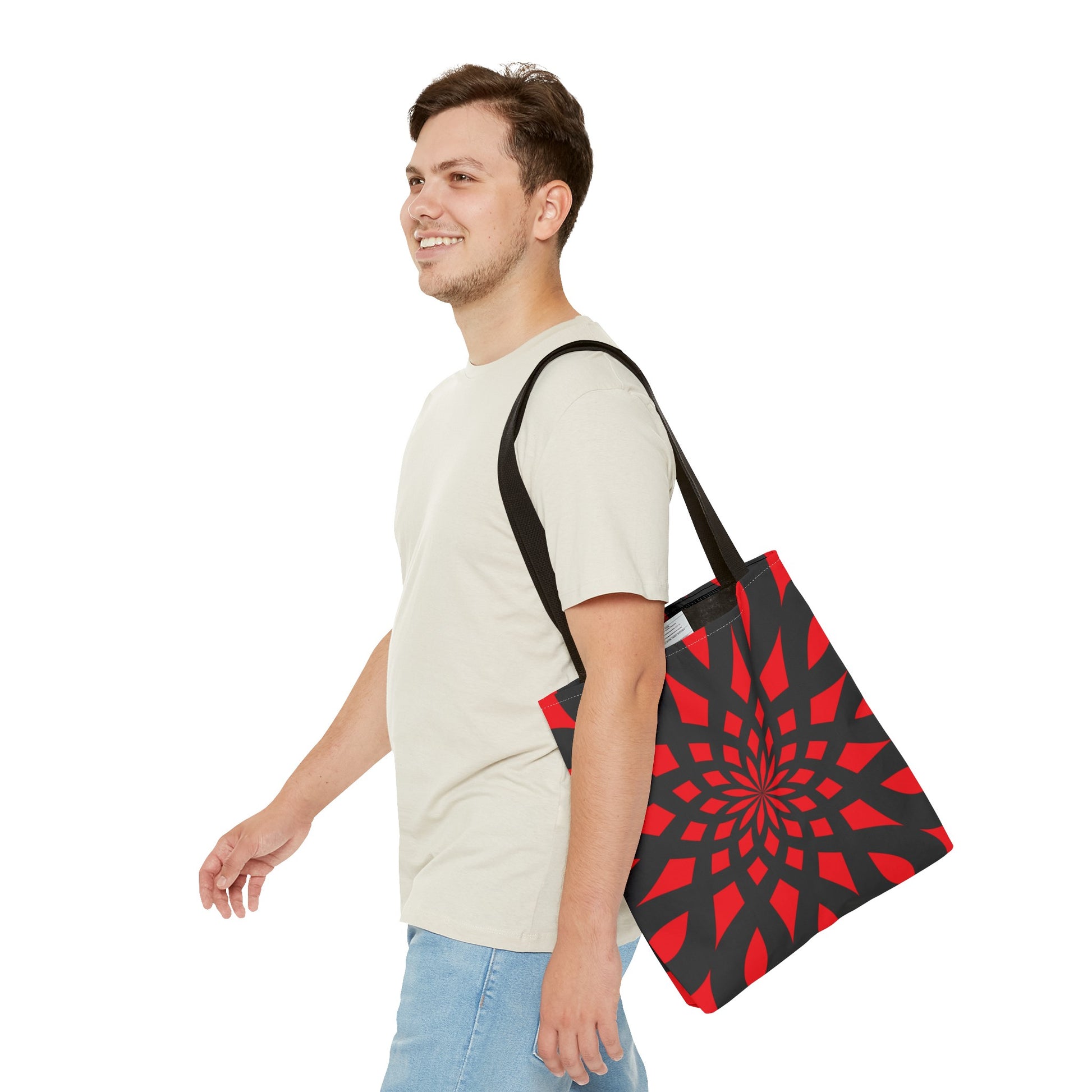 Red tote bag with black handles. Black pattern of mandala like. This size is SMALL. Made with 100% polyester. It is highly durable and perfect for everyday use. A bag is non-woven laminate inside, cotton handle, and are available in 3 sizes, 1x large storage compartment.
