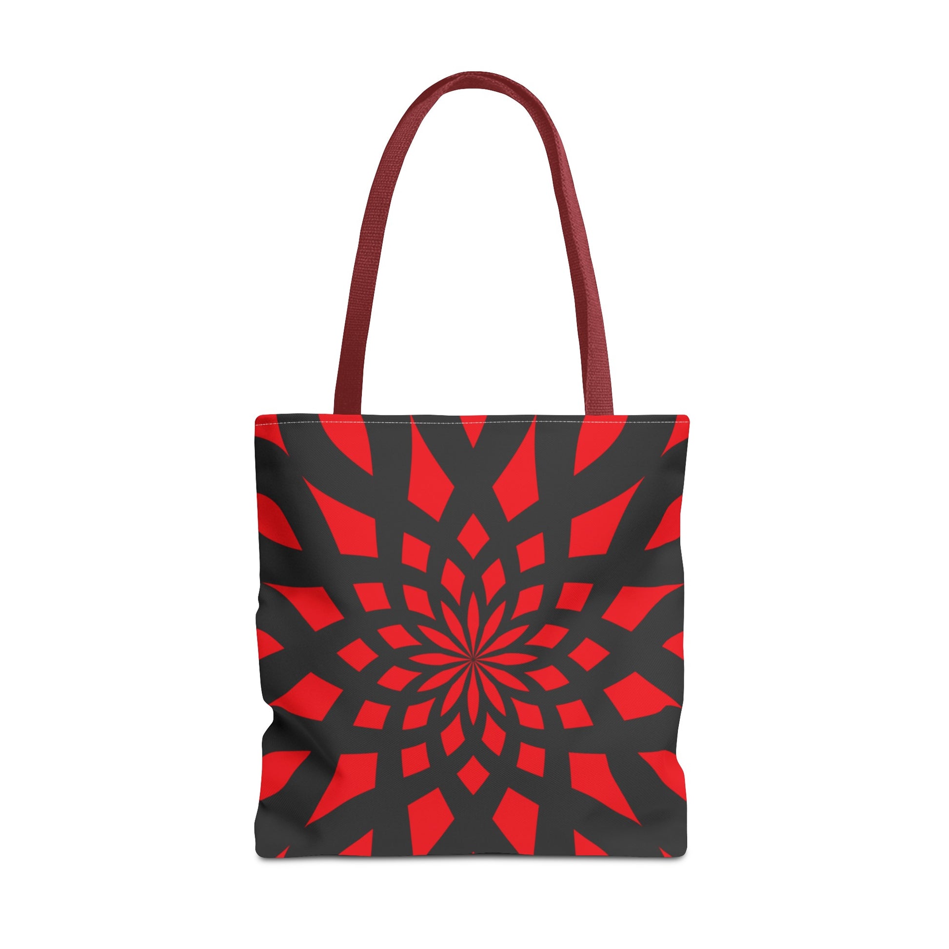 Red tote bag with red handles. Black pattern of mandala like.  Made with 100% polyester. It is highly durable and perfect for everyday use. A bag is non-woven laminate inside, cotton handle, and are available in 3 sizes, 1x large storage compartment.